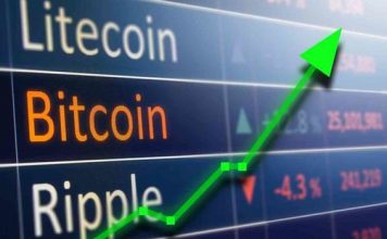 Bitcoin surges to record high of nearly $50,000 after support from major corporations