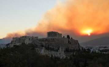 Greece wildfire rages near Athens as towns and hospitals evacuated